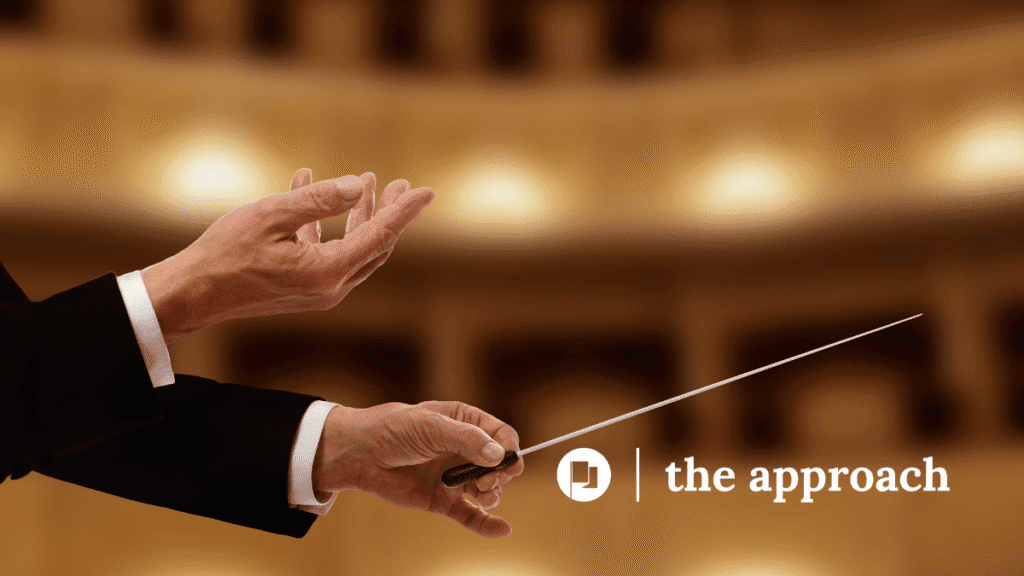 A conductor’s baton in motion, representing the rhythm and tempo needed for a golf swing.